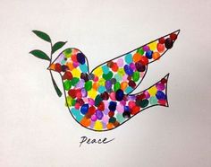 a colorful bird made out of confetti with the word peace painted on it