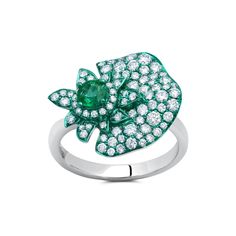 Sculptural botanical shapes indicative of Graziela's home country of Brazil. Gemstone: 1 Carat of G-H Color White Diamonds, .35 Carat of Emeralds Metal: 18K Gold Green Rhodium, 5.75 Grams Colors: White Gold, Green Rhodium Measurements: Feature 3/4" X 3/4" Luxury Green Diamond Ring With Brilliant Cut, Luxury Green Brilliant Cut Jewelry, Luxury Green Gia Certified Rings, Luxury Green Multi-stone Emerald Ring, Luxury Green Emerald Diamond Ring, Green Diamond Ring With Polished Finish, Green Multi-stone Diamond Ring For Formal Occasions, Formal Green Multi-stone Diamond Ring, Green Multi-stone Emerald Ring Fine Jewelry