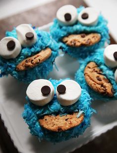 cookie monster cupcakes with blue frosting and googly eyes