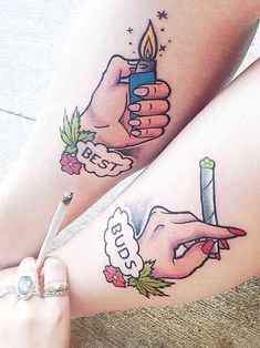 two tattoos on the legs of people with candles and flowers in their hands, one holding a lighter