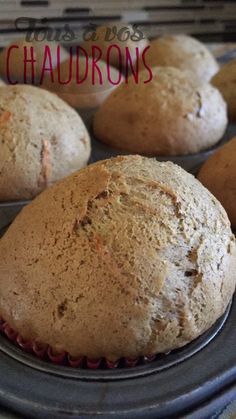 muffins sitting on top of a metal pan