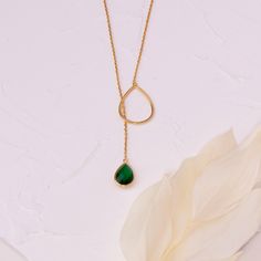 PLEASE READ DESCRIPTION & POLICIES Lariat Necklace, Emerald Green Y Necklace, Sterling Silver Teardrop Zircon Pendant, Y Style Drop Necklace, Adjustable necklace, Gift For Her  DESCRITION  This stunning lariat necklace features a green teardrop zircon gemstone pendant, beautifully crafted from 925 sterling silver and nickel-free for sensitive skin. Available in gold, rose gold, and sterling silver finishes, this adjustable necklace ranges from 16" to 24" in length, offering versatile styling. The delicate 1mm rope chain and unique lariat closure add a modern touch, making it a perfect accessory for both casual and formal outfits. **Model is wearing 23"  DETAILS  ✦ Material: 925 Sterling Silver (nickel free)(stamped) ✦ Finish: Gold, Rose Gold, Sterling Silver ✦ Gemstone: Tear-Drop Zircon (g Necklace Emerald, Zircon Gemstone, Y Necklace, Formal Outfits, Adjustable Necklace, Lariat Necklace, Necklace Sterling Silver, Drop Necklace, Tear Drop