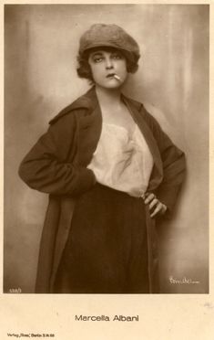 an old black and white photo of a woman