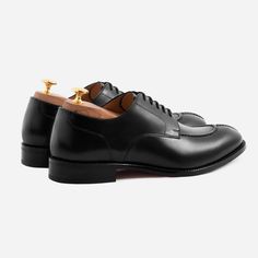 A distinguished derby. Derbies don't usually replace oxfords, but the Clegg Split-Toe Derbies sure can. Tapered quarters create a slender silhouette which is complemented by the waxed welt and waist of the outsole. Slightly raised and secured with double stitching, the apron reinforces the upper while the split-toe and fine detailing on the heel cap add a touch of flair. Built to withstand heat and cold, the Cleggs are the perfect all weather and everyday shoe. This product is made from full-gra Classic Black Lace-up Shoes For Derby, Black Plain Toe Loafers For Derby, Black Cap Toe Loafers For Derby, Timeless Black Derby Shoes For Semi-formal Occasions, Black Moc Toe Lace-up Shoes For Formal Occasions, Masculine Moc Toe Oxfords For Business, Black Moc Toe Oxfords For Semi-formal Occasions, Black Brogue Derby Shoes For Formal Occasions, Black Plain Toe Dress Shoes For Derby