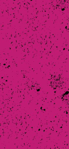 an abstract pink background with black spots