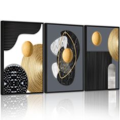 three black and gold wall art pieces with circles, balls, and shapes on them