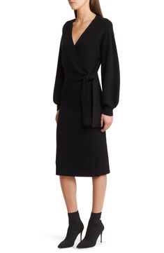 This faux-wrap sweater-dress knit with soft ribbing features a sultry dipped neckline and waist-cinching sash. 40" length (size medium) Surplice V-neck Long sleeves with ribbed cuffs Attached waist tie 50% viscose, 28% polyester, 22% nylon Hand wash, dry flat Imported Fitted Long Sleeve Belted Dress For Fall, Black Fitted V-neck Belted Dress, Fitted Belted Dress For Fall, Fitted Faux Wrap Dresses For Fall, Fitted Belted Knee-length Dress For Fall, Fitted Knee-length Belted Dress For Fall, Fall Long Sleeve Solid Wrap Dress, Long Sleeve Solid Color Wrap Dress For Fall, Fall Dress With Faux Wrap And Surplice Neckline