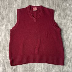 Vintage 80s Northwestern Knitting Company Basic Blank Dress Formal Casual Wool Material Grandpa Fashion Maroon Knit Sweater Vest Large Mens Condition:  Excellent Used Condition  = No Flaws Measurements: Please see photos above for all measurements IF YOU BUY TWO OR MORE ITEMS USE THE CODE BUNDLE @ CHECK TO SAVE 20% WE SHIP WITHIN 24 HOURS AFTER PURCHASE! Please be aware that we do not offer free returns!! The Buyer is responsible for the cost of the return label.  Follow us on TikTok & Instagram @findsnostalgic and tag us in your finds Vintage V-neck Knit Sweater, Winter Knit V-neck Sweater Vest, Casual Fitted Wool Sweater Vest, Retro Sleeveless Sweater For Winter, Retro Sleeveless Winter Sweater, Casual Sleeveless Wool Sweater, Retro Crew Neck Sweater Vest For Fall, Vintage Sleeveless Sweater For Winter, Vintage Sleeveless Winter Sweater