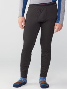 Layer smart for chilly adventures. Whether you're trekking through the forest or bombing down the slopes  the breathable  warm men's Patagonia Capilene midweight bottoms are an ideal base layer. Patagonia Moisture-wicking Bottoms For Hiking, Functional Patagonia Moisture-wicking Bottoms, Functional Moisture-wicking Patagonia Bottoms, Patagonia Functional Outdoor Bottoms, Patagonia Moisture-wicking Bottoms For Outdoor Activities, Functional Patagonia Hiking Bottoms, Functional Hiking Bottoms By Patagonia, Outdoor Breathable Midweight Bottoms, Waterproof Midweight Sports Bottoms