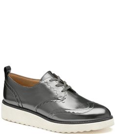 From Johnston & Murphy&#x2C; the Women's Mitzi Metallic Leather Oxfords feature:Metallic leather upperScalloped wingtip detailLeather welt detailBack pull tabLace up closureLeather and microfiber liningCushioned&#x2C; leather covered footbedLightweight TRUFOAM® midsole provides ultra cushioning for all day comfortLightweight TRUFOAM® EVA outsoleApprox. 1.25" wedge heightImported. Wingtip Oxford Shoes With Perforations, Oxford Leather Wingtip Shoes With Perforated Toe Box, Leather Low-top Oxfords With Perforations, Low-top Leather Derby Shoes With Perforated Toe, Semi-formal Leather Oxford Shoes With Perforated Toe Box, Loafer Shoes Women, Pewter Metal, Johnston Murphy, Boy Shoes