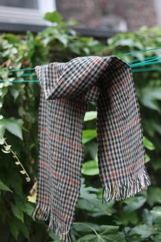 Wrap up from the elements with this vintage checkered scarf. A mix of browns and reds, the 90s design is classic in pattern and palette. The tasseled details give it a charming touch. Checkered Scarf, 90s Design, Tassel Scarf, Style Expert, The 90s, Winter Scarf, Festival Season, Scarf Wrap, Scarf Accessory