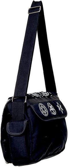 The Pentagram Black Messenger Bag has a zip opening and a roomy inner compartment which will easily accommodate a purse wallet and mobile as well as all other daily essentials. The outside of the bag has a stunning Pentagram applique and there is an extra front pocket. The long shoulder strap is fully reinforced for security and this messenger bag would make an ideal addition to any modern alternative fashion collection. 14 x 11 x 5 inches Black Alternative, Black Messenger Bag, The Pentagram, Daily Essentials, Alternative Fashion, Purse Wallet, Fashion Collection, Front Pocket, Messenger Bag