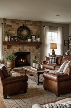 a living room with two couches and a fire place in it's center