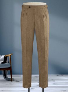 Make a chic and dapper style statement with our Naples Sahara Tweed Highland Tweed Trousers that have a captivating appearance. Crafted with pure wool fabric, our trousers are cut from the cloth with a brown tinge guided by a smooth and lustrous texture that wraps comfortably for your day. So become instantly memorable with our trousers that evolve imperatively, making your first impression the last. 
 
 Look Includes   Naples     Sahara     Tweed  Fabric  Cross Pocket  Forward 2 Pleats  Side Ta Elegant Tweed Pants For Winter, Brown Winter Workwear Dress Pants, Winter Workwear Brown Dress Pants, Classic Brown Winter Pants, Brown Dress Pants For Winter Workwear, Brown Winter Dress Pants For Workwear, Brown Dress Pants For Office In Winter, Tailored Brown Dress Pants With Welt Pockets, Tailored Brown Pants For Winter