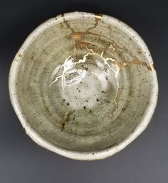 a white bowl sitting on top of a table