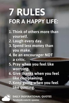 a coffee cup with the words 7 rules for a happy life on top of it