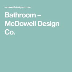 the bathroom - mcd dowell design co logo is shown in white on a blue background