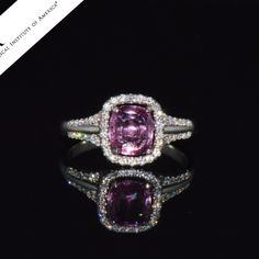 Vintage Henri Daussi Platinum Ring Set With Gia Certified Natural 2.08cts Diamond And Purple-Pink Sapphire. This Ring Features A Large Gia Certified 1.51cts Natural Purple-Pink Sapphire In Center. The Cushion Modified Brilliant Cut Sapphire Is Surrounded With Round Brilliant Cut Diamonds Throughout Adding Up To 0.57cts. The Diamonds Extended Down The Shank Of This Ring Too. The Gorgeous Purple-Pink Sapphire In This Ring Has A Desirable Vivid Pink Purplish Color With Shades Of Light Neon Purple / Pink, Dark Pink And Neon Pinkish Purple Colors. The Sapphire Has Water Like, See Through Clarity And Looks Flawless To The Naked Eye. The Sapphire Has Been Certified By Gia (Usa), To Be A Natural P Henri Daussi, Pinkish Purple, American Government, Neon Purple, Pink Dark, Platinum Ring, Round Brilliant Cut Diamond, Diamond Clarity, Pink Sapphire