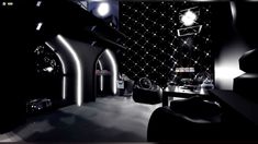 a black and white photo of a room with lights on the ceiling, chairs and tables