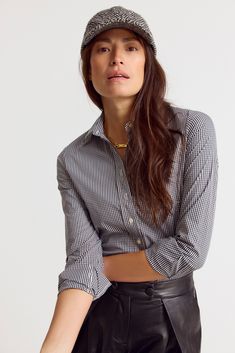 The Icon Shirt runs tailored at the waist, chest and back. For a contemporary fit, order true size. For a blousier fit, size up, or consider The Boyfriend Shirt for an even looser look.

 Meet your new closet staple: the small check shirt, in our perfect-fit cotton stretch. We designed our best-selling Icon Shirt to be fitted throughout, giving you a body-hugging shape yet eliminating blouse gape completely.  Our cotton stretch is sourced near and produced in our factory in Portugal by a local t Slim Fit Button-up Top For Work, Modern Slim Fit Button-up Tops, Black Spread Collar Tops For Workwear, Modern Business Casual Top With Spread Collar, Modern Black Blouse For Business Casual, Modern Business Casual Button-up Tops, Black Relaxed Fit Blouse For Business Casual, Chic Slim Fit Top With Spread Collar, Modern Black Tops For Business Casual