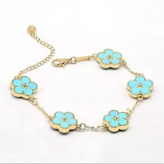 Flower Power Bracelet Nwt Light Blue Flower Jewelry For Spring, Spring Turquoise Bracelet Jewelry, Spring Turquoise Jewelry Bracelet, Elegant Blue Bracelets For Spring, Turquoise Bracelet Spring Gift, Spring Turquoise Bracelet Gift, Spring Gift Turquoise Bracelet, Elegant Blue Flower Bracelets, Rainbow Crystal Bracelet