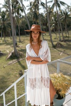 Our fascinating Abigail Lace Maxi Dress in white with its unique lace trims is a fresh and feminine design, created for a relaxed resort feel that will easily see you through sun-drenched days and balmy nights. Specs: Material: 100% Cotton V-neck Beach Dress With Lace Trim, V-neck Beach Dress With Lace Trim As Cover-up, White Breezy Cover-up For Vacation, White Summer Festival Cover-up, Summer Beach Dress With Lace Patchwork, Summer Dress With Lace Trim For Beach, White V-neck Breezy Cover-up, White Summer Cover-up For Vacation, Beachy White Beach Dress For Summer