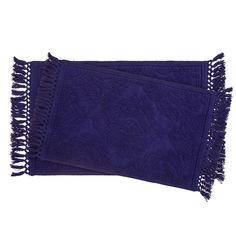 two purple towels with fringes on them