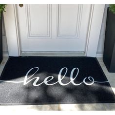 a door mat with the word hello painted on it