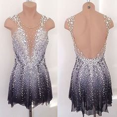 the back of a dress with sequins on it