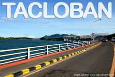 the words tacloban are written in large letters over an image of a highway