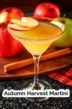 an autumn harvest martini with apples in the background