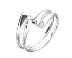 two white gold rings with diamonds on each side and an arrow in the middle, set against