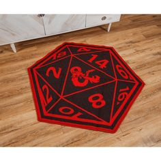 a red and black rug with numbers on it in the shape of a d20