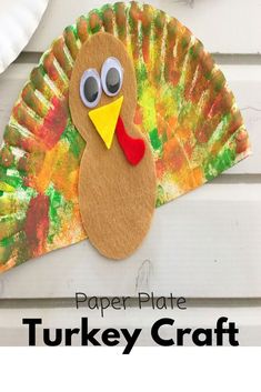 a paper plate turkey craft on a white wooden background with the words, paper plate turkey craft