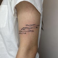 a person with a tattoo on their arm