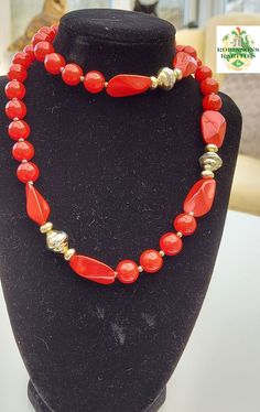 "Very nice Opera length beaded necklace, made with lipstick red round & nugget shaped plastic beads, & gold seed beads. CONDITION REPORT Seems to be in very good condition. MEASUREMENTS LENGTH: 29.5\"/75cm WEIGHT: 277g Gift boxed  WELCOME! to Robinsons Rarities            OVERSEAS BUYERS:  EXCESS POSTAGE WILL BE REFUNDED I.I have tried to take as accurate photographs as possible but, coloration may differ slightly from my photos, as each monitor and screen varies when viewing photographs. II.The Vintage Red Gemstone Beads, Vintage Red Hand-strung Beaded Necklaces, Red Coral Beaded Necklaces With Faceted Beads, Red Beaded Necklace With Oval Large Beads, Hand-strung Red Coral Beaded Necklaces, Gold Beaded Red Coral Necklaces, Adjustable Red Beaded Necklace With Gold Beads, Adjustable Red Necklace With Gold Beads, Red Hand-strung Oval Beaded Necklaces