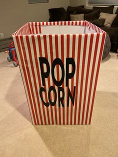 a pop corn bag sitting on the floor