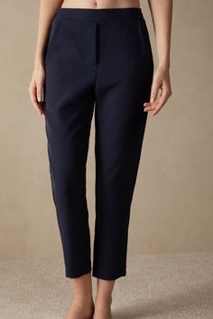 Full-length trousers featuring two pockets, faux back pocket and covered elasticated waist. Chic Bottoms With Pockets And Straight Hem, Elegant Bottoms With Pockets For Work, Elegant Pants With Elastic Waistband And Tapered Leg, Elegant Workwear Bottoms With Pockets, Elegant Tapered Leg Pants With Elastic Waistband, Elastane Bottoms With Pockets Straight Hem, Chic Bottoms With Welt Pockets And Straight Hem, Chic Pants With Side Pockets And Straight Hem, Elegant Business Casual Bottoms With Pockets