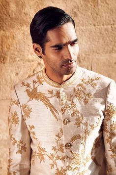 Ivory raw silk sherwani with antique gold dori embroidery work in floral vine, birds pattern. Paired with an inner kurta and pant. - Aza Fashions Ivory Sherwani, Raw Silk Embroidery, Dori Work, Winter Photo, Embroidery Floral, Bird Patterns, Silk Embroidery, Churidar, Inspiration Board