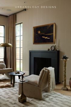 a living room filled with furniture and a fire place in front of a painting on the wall