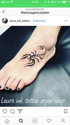 a person with a tattoo on their foot