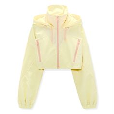 Zara Yellow Nylon Cropped Jacket With Hood. Front Zipper Pockets, Elastic Cuff Sleeves And Pink Trim Details. Never Used And In Excellent Clean Condition And Comes From A Smoke Free Home. Love This Color Combination. Spring Stretch Nylon Outerwear, Spring Nylon Outerwear, Spring Solid Nylon Outerwear, Nylon Long Sleeve Windbreaker For Spring, Fitted Nylon Windbreaker For Spring, Fitted Spring Windbreaker, Sporty Fitted Windbreaker For Spring, Fitted Windbreaker With Pockets For Spring, Trendy Yellow Hooded Outerwear