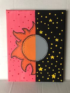 two canvases with different designs on them, one is pink and the other is black