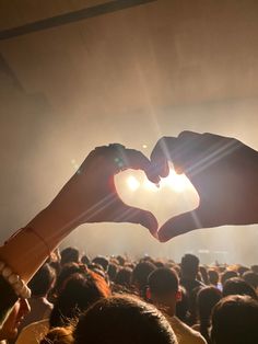 Two hands forming a heart Couple At A Concert Aesthetic, Concert Soft Launch, Concert Photo Inspiration, Couple Concert Pictures Aesthetic, Concert Name Ideas, Concert With Best Friend, Concert Photo Ideas Couple, Couple Concert Aesthetic, Couple In Concert