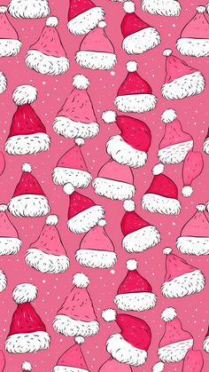 a pink background with santa hats on it