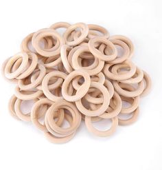 several wooden rings are stacked on top of each other in the shape of an o - ring