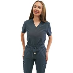 Fubu Scrubs are fashion-forward and performance driven. A brand with a fashion legacy and a highly distinctive identity, they will meet the demands for stylish, yet functional medical garments. Fubu Scrubs are redefining industry standards and empowering healthcare professionals to express their individuality with confidence. Size: S.  Color: Gray.  Gender: female.  Age Group: adult. Nurse Uniform, Womens Scrubs, Scrub Tops, Healthcare Professionals, Scrubs, Gender Female, Nursing, Fashion Forward, Age Group