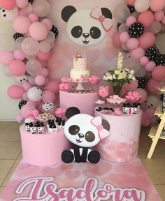 a panda bear themed birthday party with balloons and decorations