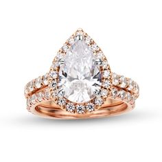 a pear shaped diamond engagement ring set in rose gold