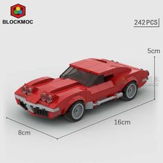 a red model car is shown with measurements